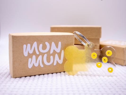 Placa amarilla con diseño de piña y empaque Munmun. Accesorio personalizado brillante.