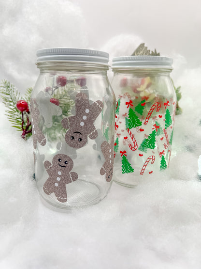 2 Frascos de vidrio con diseño navideño. Accesorio ideal para la temporada navideña.